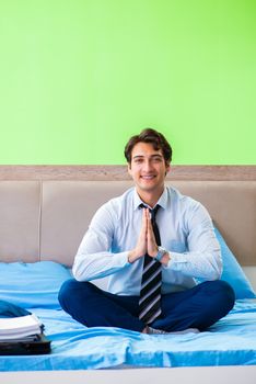 Businessman working in the hotel room