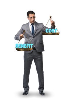 Businessman in cost benefit balance concept