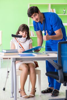 Female patient visiting male doctor in medical concept 