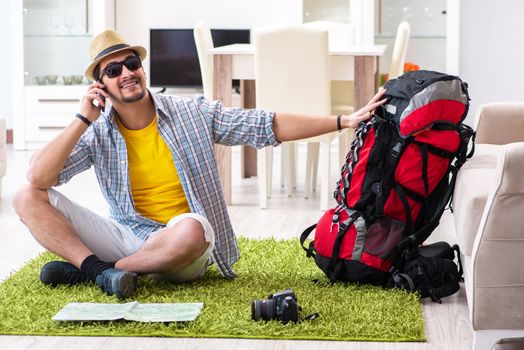 Man planning his travel with map