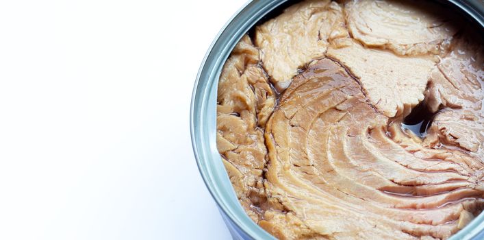 Canned tuna fish on white background.