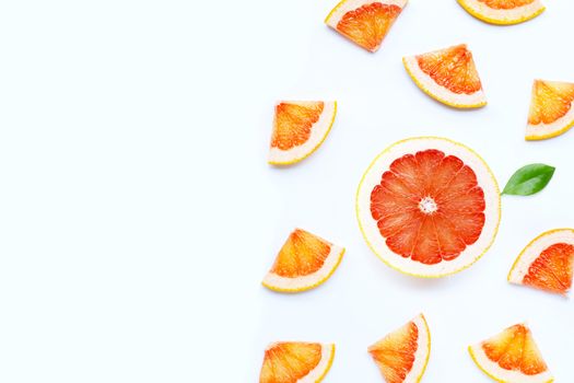 High vitamin C. Juicy grapefruit slices on white background.