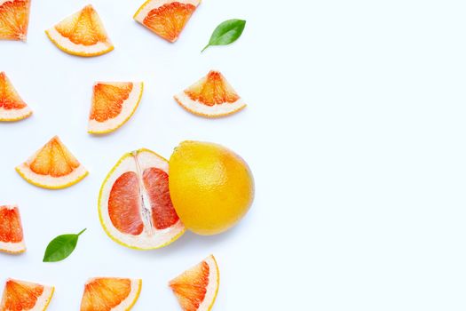 High vitamin C. Juicy grapefruit slices on white background.