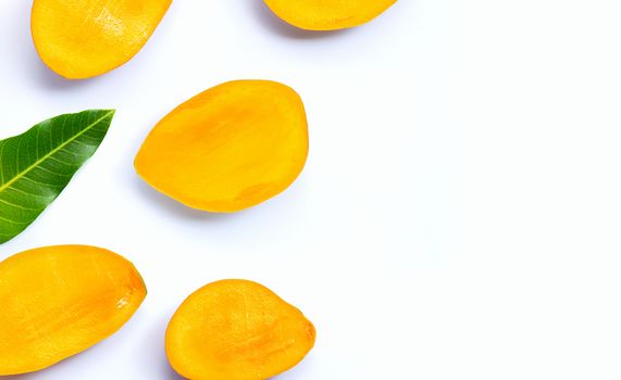 Tropical fruit, Mango slices on white background. Top view