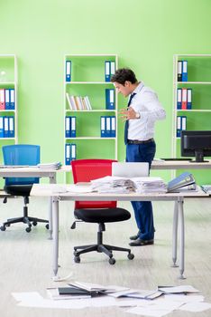 Frustrated businessman stressed from excessive work