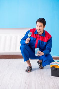 Young man doing home renovation 