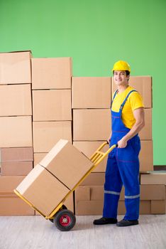 Man contractor working with boxes delivery