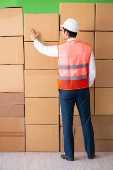 Man contractor working in box delivery relocation service