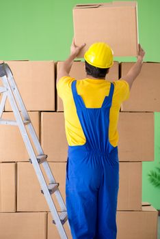 Man contractor working with boxes delivery
