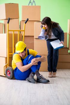 Woman boss and man contractor working with boxes delivery