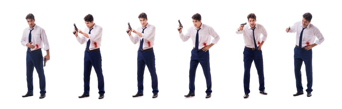 Businessman wounded in gun fight isolated on white
