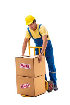 Young contractor with fragile boxes isolated on white