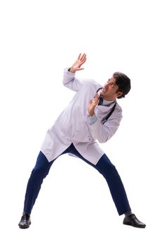 Young handsome doctor under pressure isolated on white