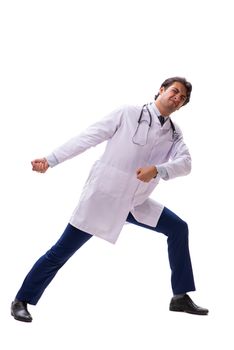 Young handsome doctor under pressure isolated on white