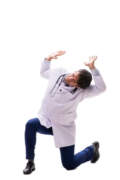 Young handsome doctor under pressure isolated on white