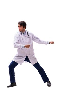 Young handsome doctor under pressure isolated on white