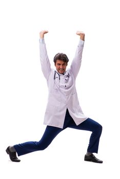 Young handsome doctor under pressure isolated on white