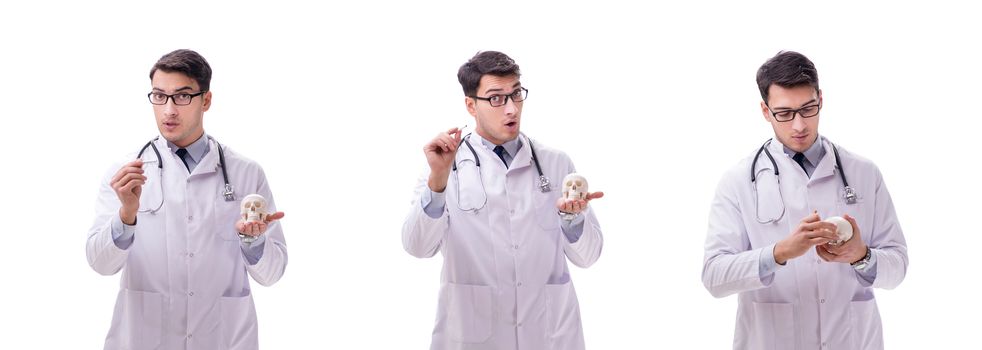 Young male doctor with skeleton isolated on white