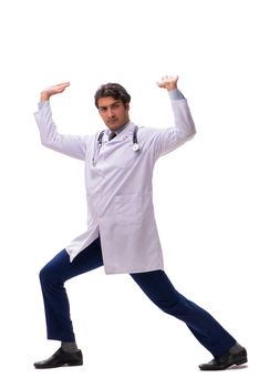 Young handsome doctor under pressure isolated on white
