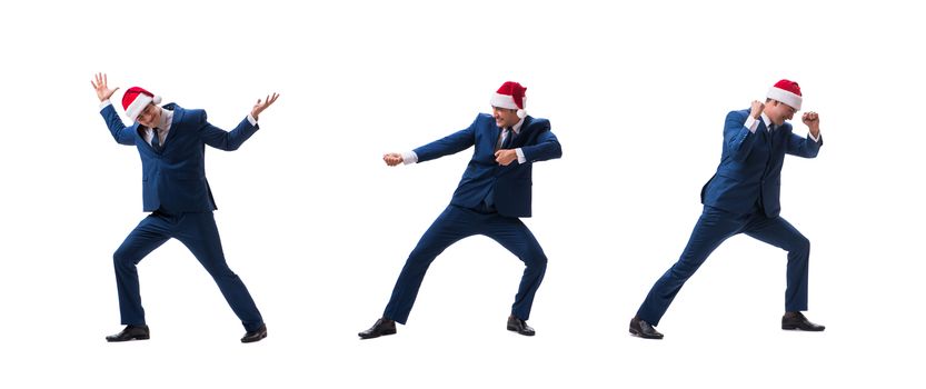 Young busnessman wearing santa hat in christmas concept on white