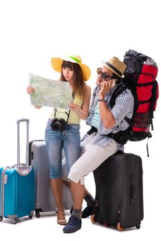 Young family preparing for vacation travel on white