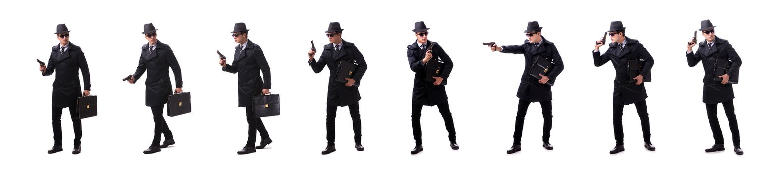 Man spy with handgun isolated on white background