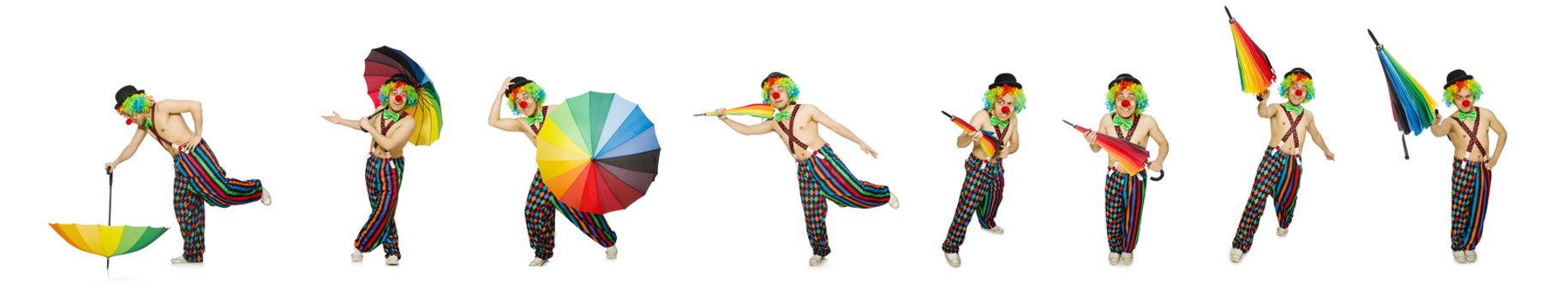 Clown with umbrella isolated on white