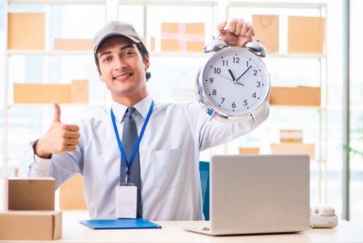 Male employee working in box delivery relocation service