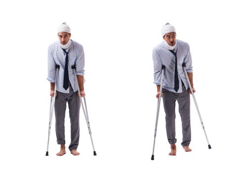 Injured businessman isolated on white 