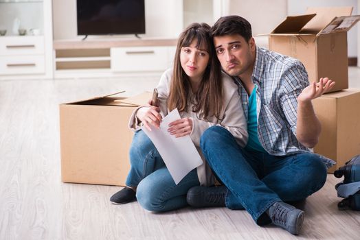 Young couple receiving foreclosure notice letter