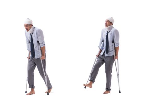 Injured businessman isolated on white 