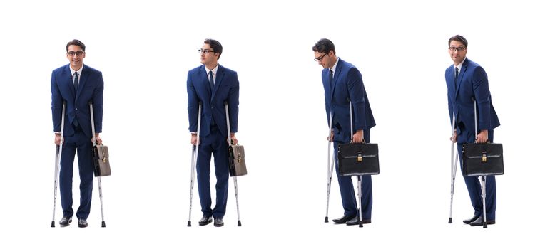 Businessman walking with crutches isolated on white background