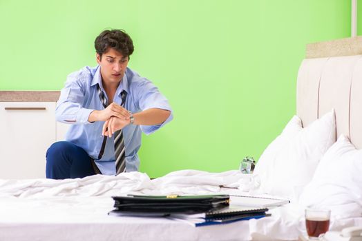 Young businessman employee late for office
