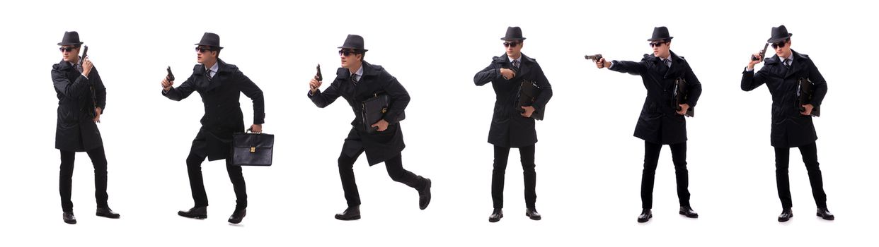 Man spy with handgun isolated on white background