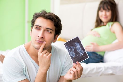 Young family finding out about pregnancy