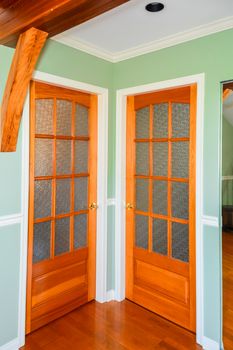 Wooden french doors. Interior design of luxury residential house