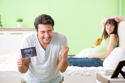 Young family finding out about pregnancy