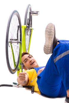 Man repairing his bike isolated on white background