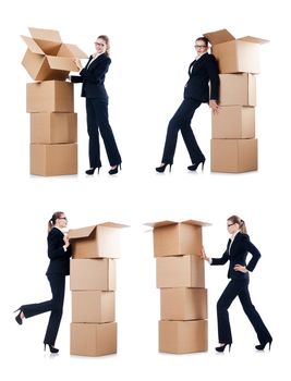 Businesswoman with boxes isolated on white