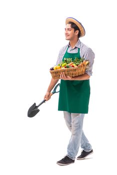 Young farmer with fresh produce isolated on white background