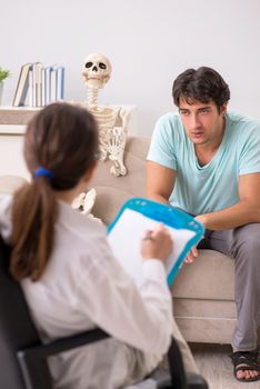 Young patient visiting psychologist for therapy
