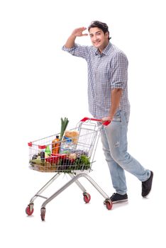 Young man with supermarket cart trolley on white