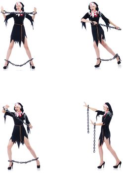 Young beautiful nun with shackles isolated on white