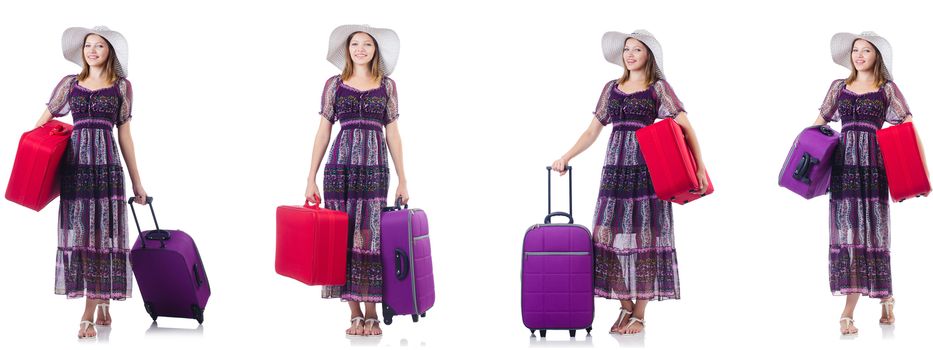 Young woman with suitcases isolated on white