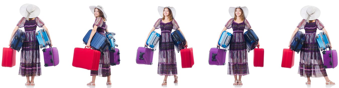 Young woman with suitcases isolated on white