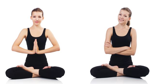 Young woman sitting cross-legged and doing yoga 