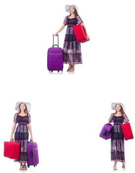 Young woman with suitcases isolated on white