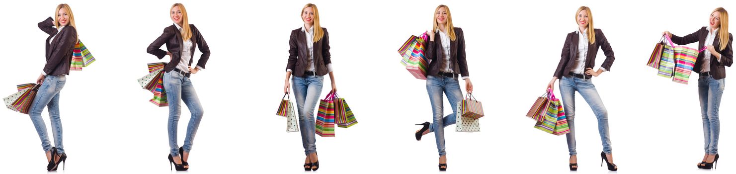 Beautiful woman with shopping bags isolated on white