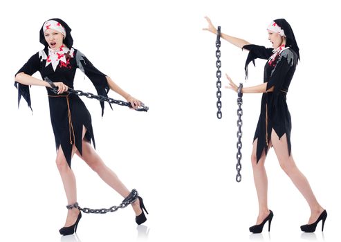 Young beautiful nun with shackles isolated on white