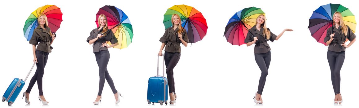 Woman with suitcase and umbrella isolated on white 